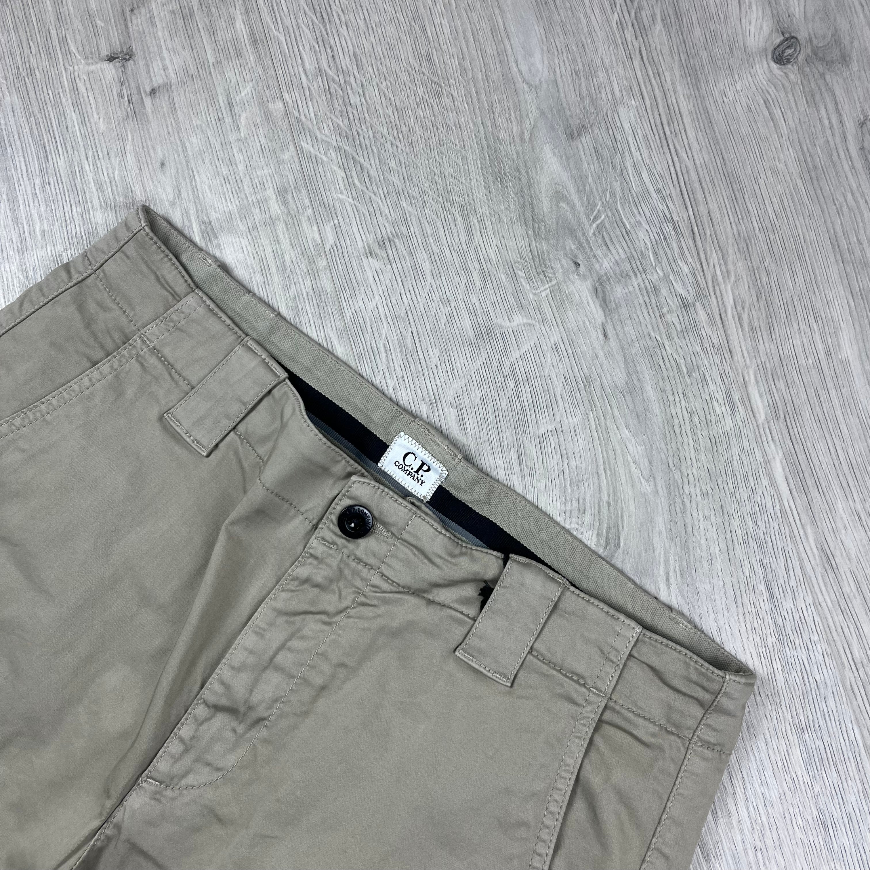 CP Company Stretch Sateen Cargo Shorts in Vintage Khaki. On sale at Open Attire.