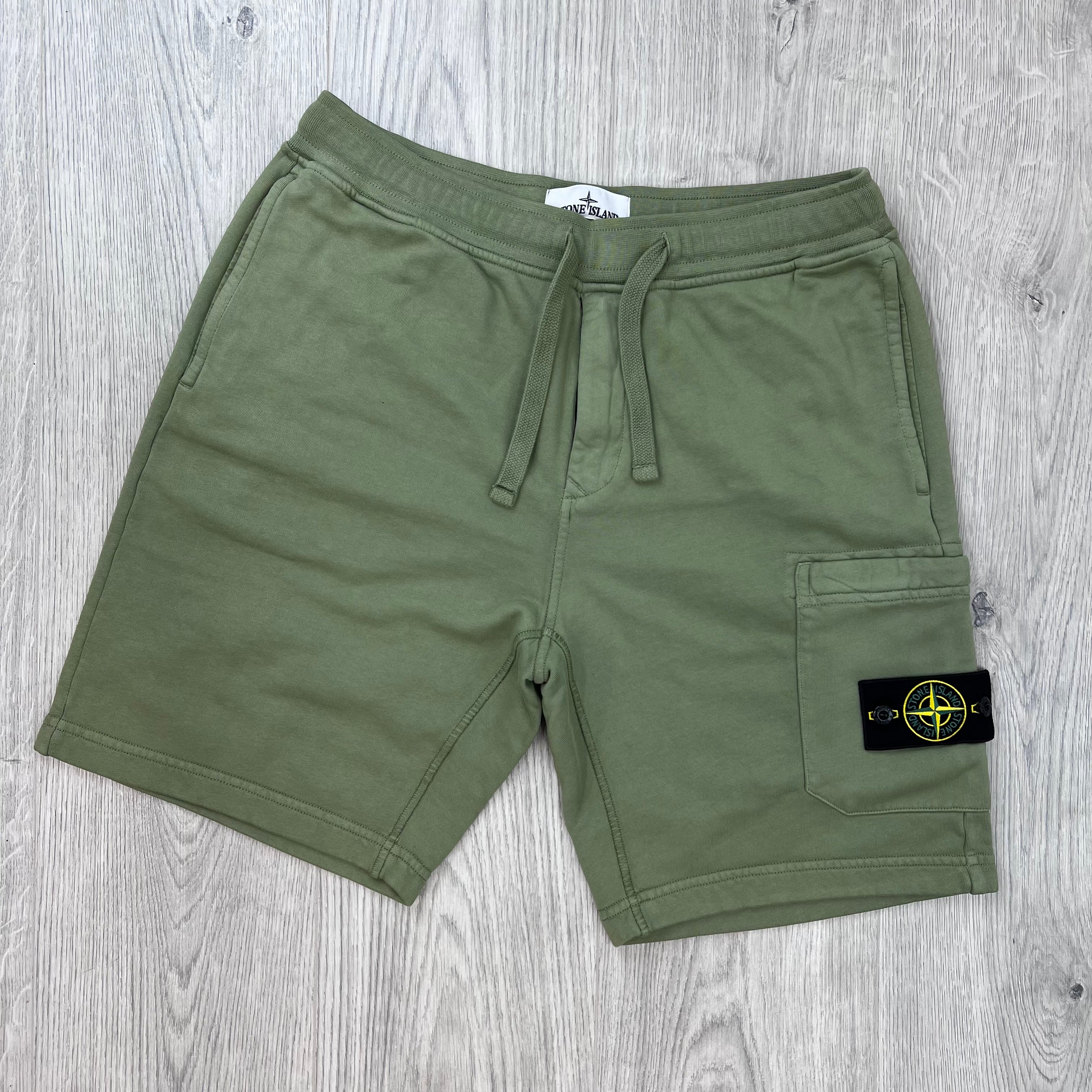 Front view of the Stone Island Jersey Shorts in Laurel Green.