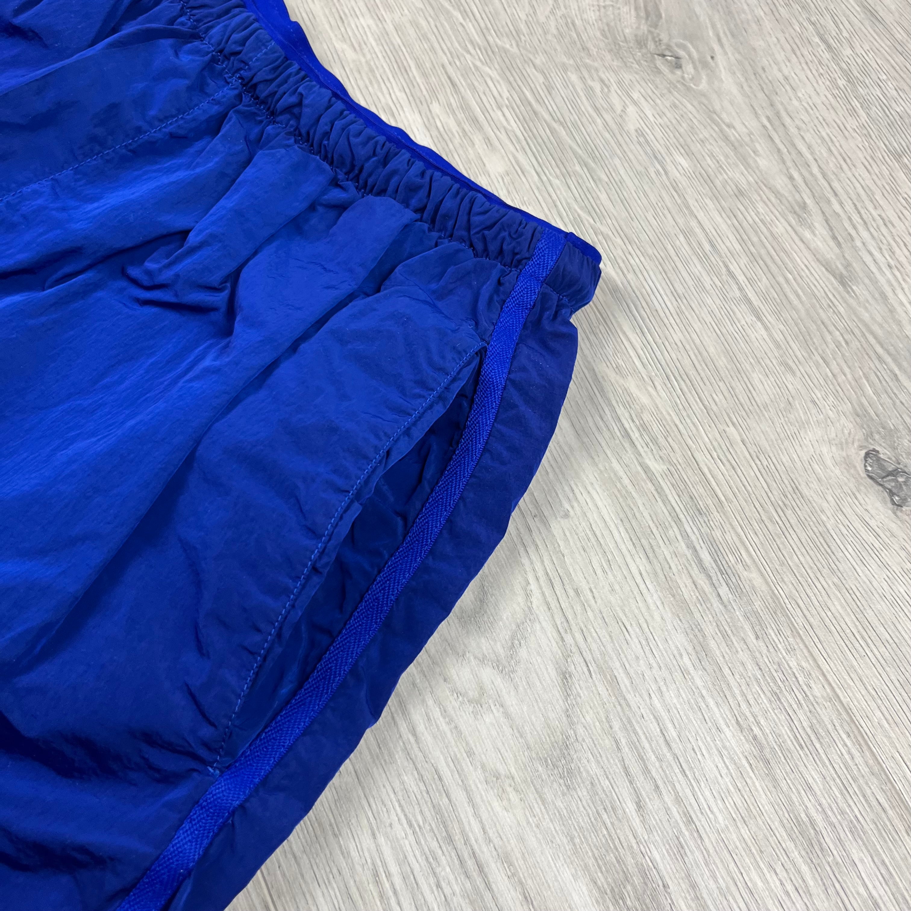 Burberry Nylon EKD Swim Shorts in Blue. On sale at Open Attire.