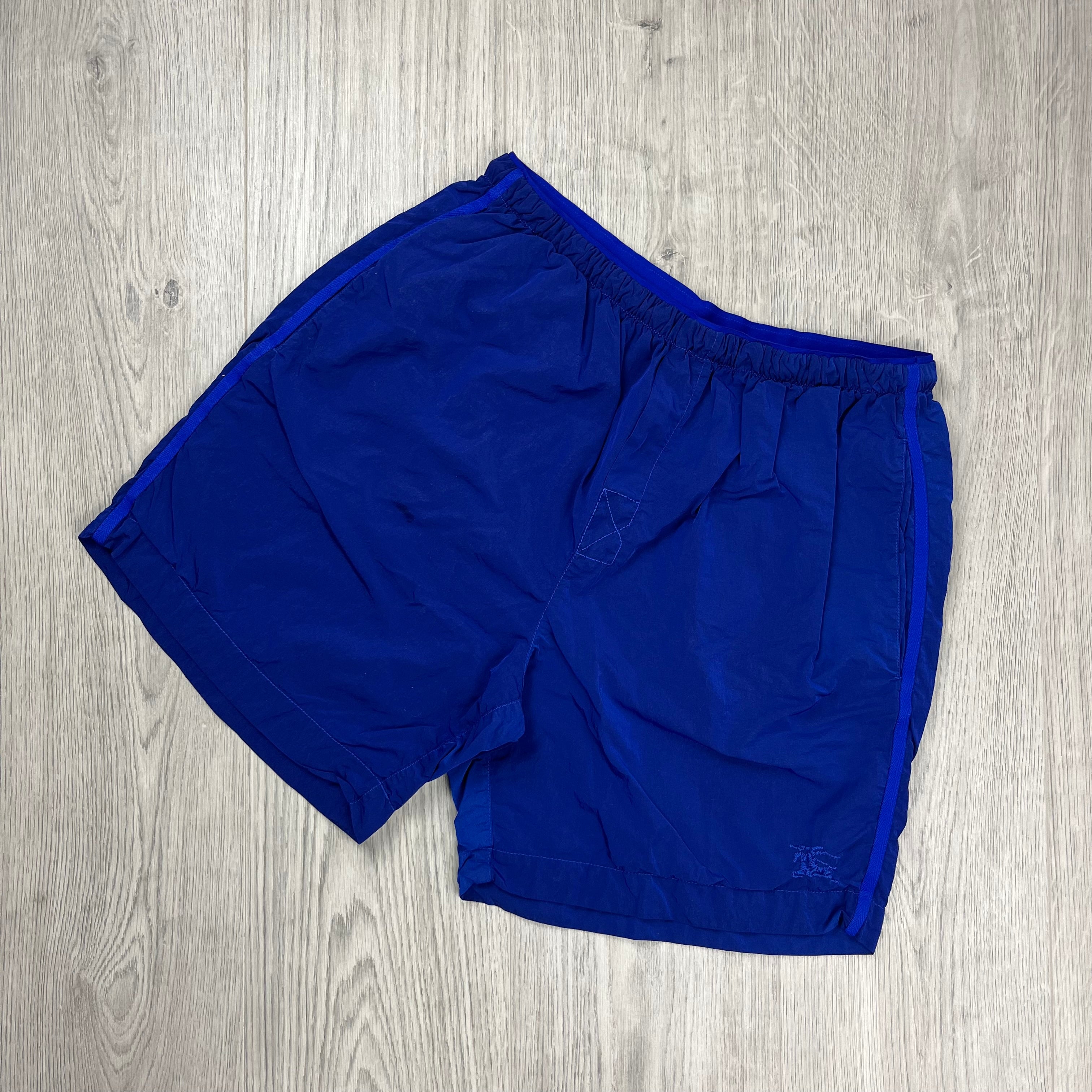 Burberry Nylon EKD Swim Shorts in Blue. On sale at Open Attire.