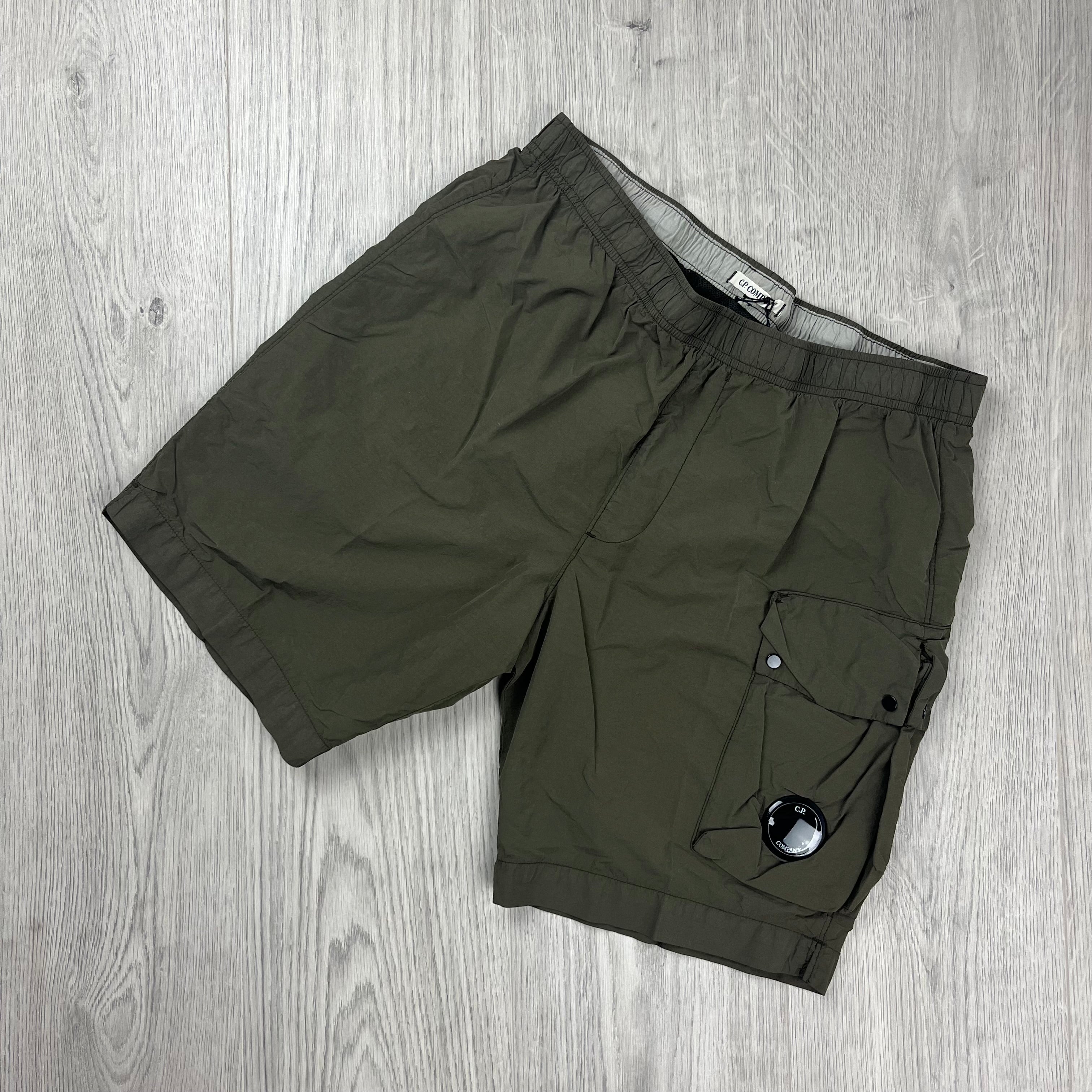 CP Company Flatt Nylon Lens Swim Shorts in Ivy Green. On sale at Open Attire.