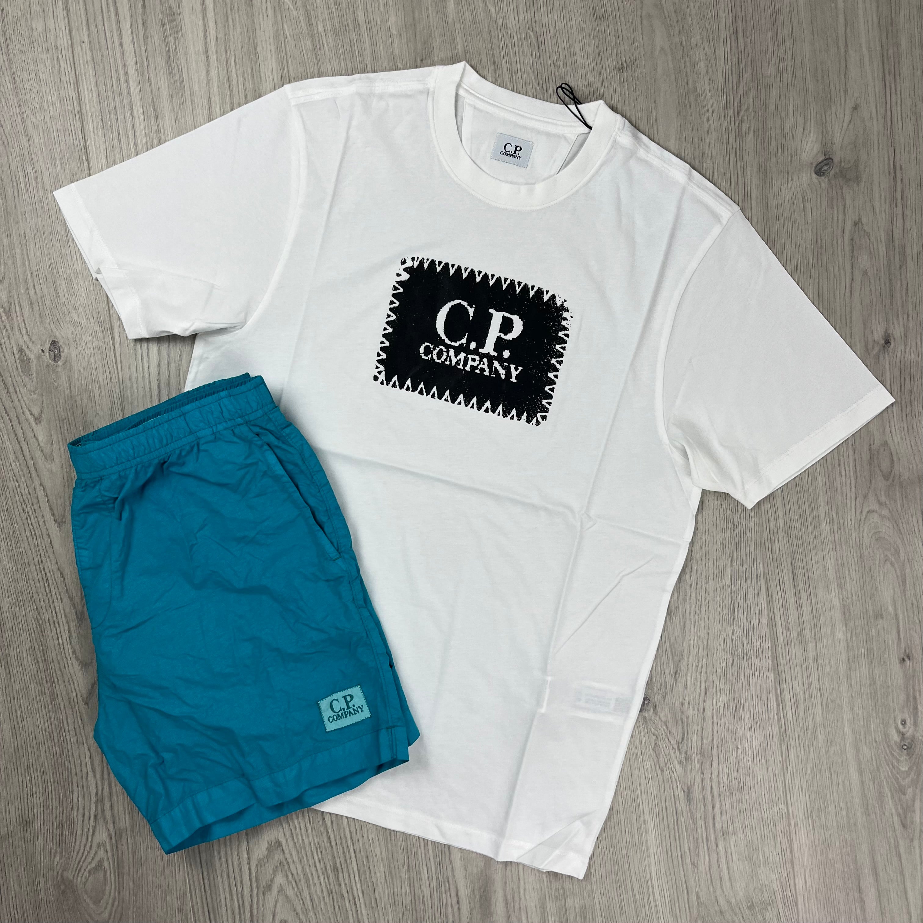 CP Company Holiday Set in Gauze White/Tile Blue. On sale at Open Attire. 