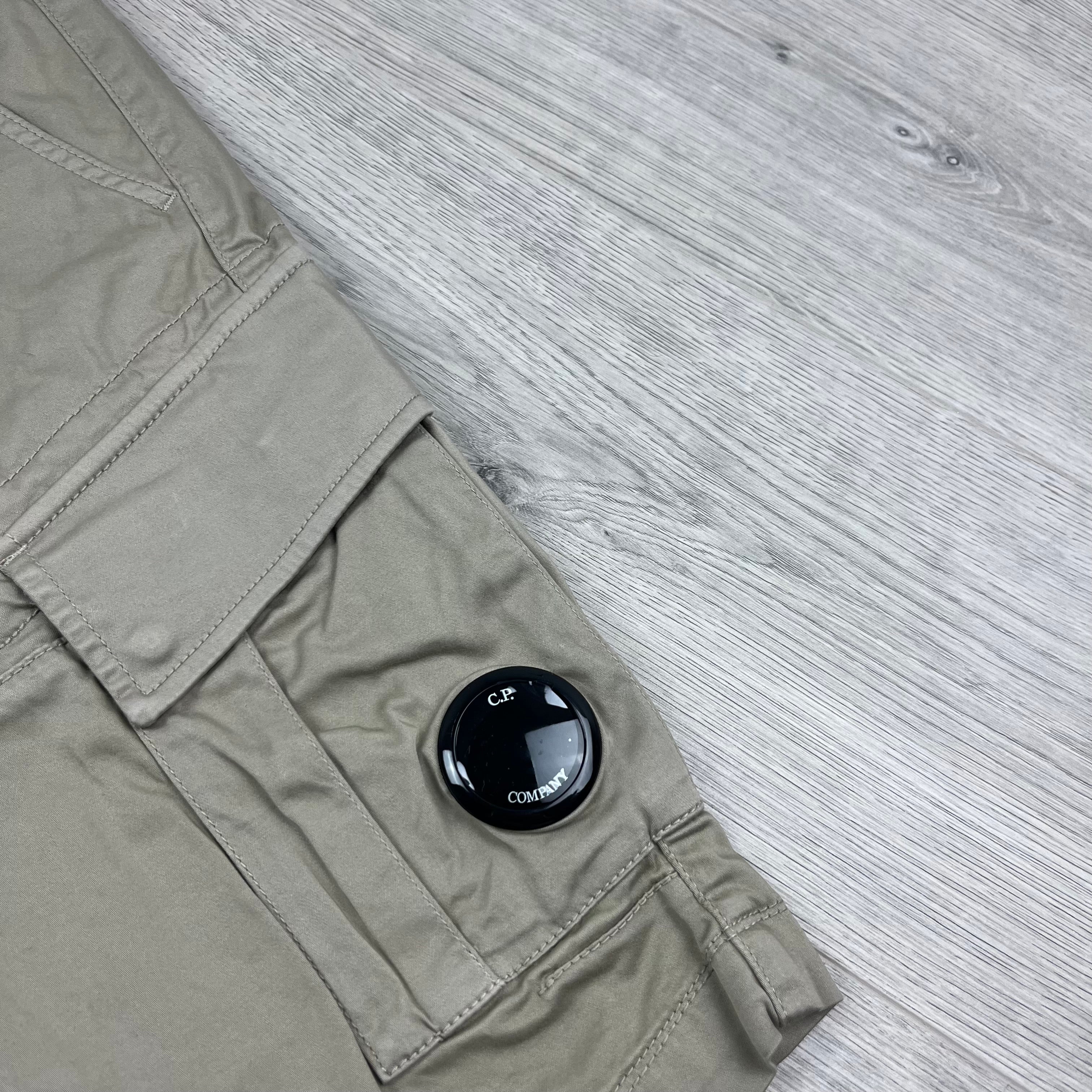 CP Company Stretch Sateen Cargo Shorts in Vintage Khaki. On sale at Open Attire.
