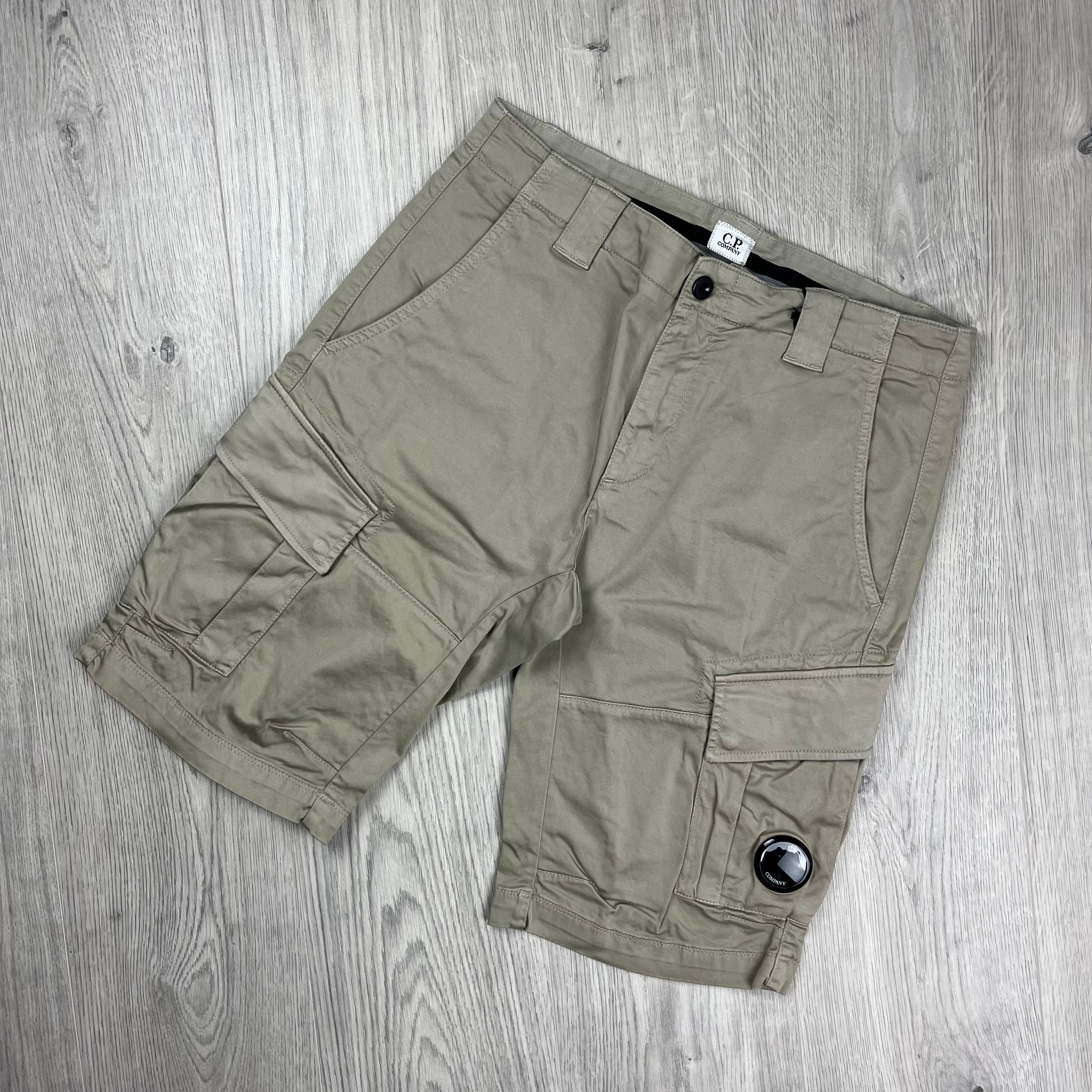 CP Company Stretch Sateen Cargo Shorts in Vintage Khaki. On sale at Open Attire.