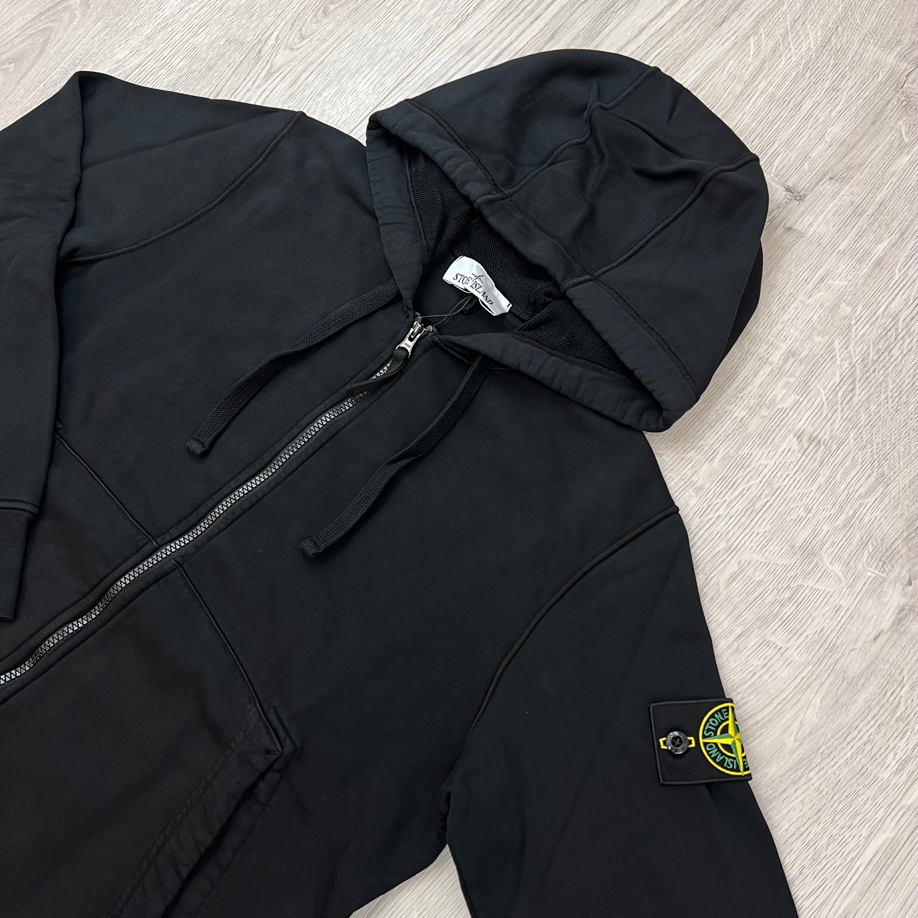 Angled view of the Stone Island Zip Hoodie in Black. 